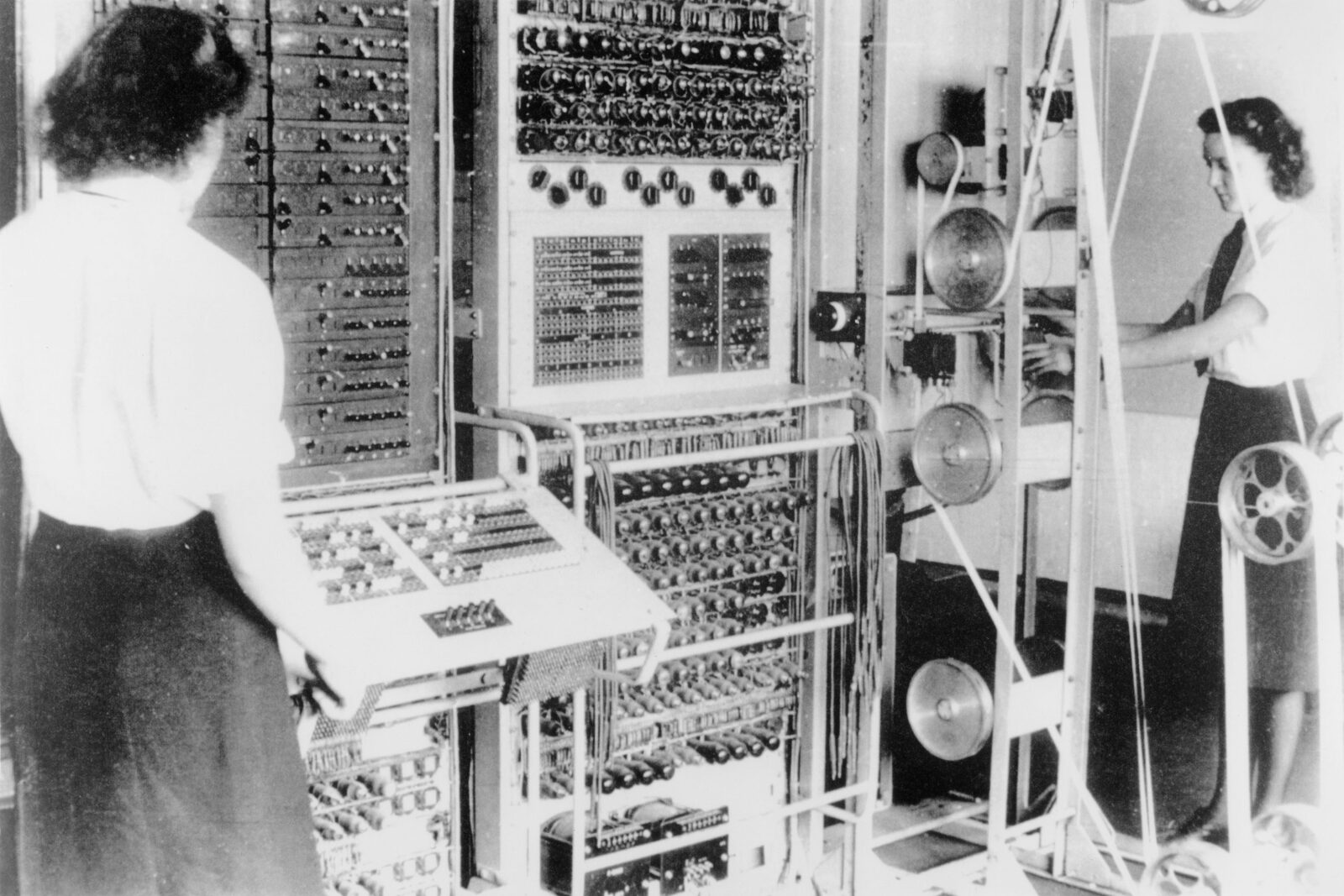 Dorothy Du Boisson and Elsie Booker running Colossus, Bletchley Park’s electronic codebreaking machine, during the Second World War